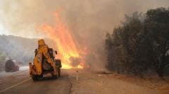Two firefighters die in Crete as wildfires threaten parts of southern Europe